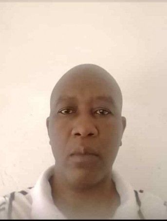 Reginald Kwenda, 50, Zimbabwe